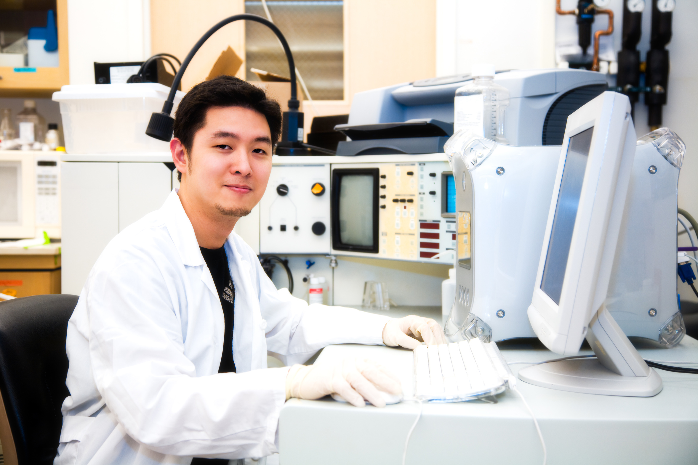 A shot of a scientist working on a computer in a laboratory